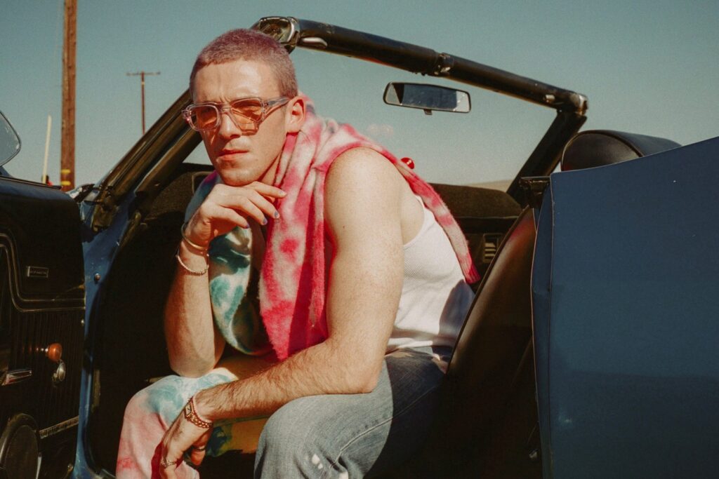 Man sits in car