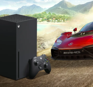 Red Mercedez Benz next to an Xbox console and controller