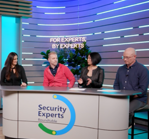 Four people take part in a panel discussion