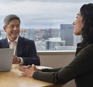 Woman and man meeting in an office