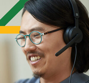 Man wearing a set of earphones with a microphone