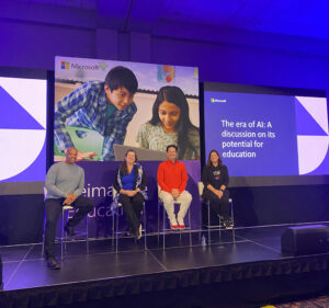 Two men and two women on stage at ISTE event