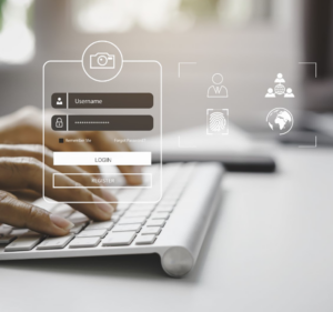 Fingers typing on a keyboard, overlaid with an image of a login screen