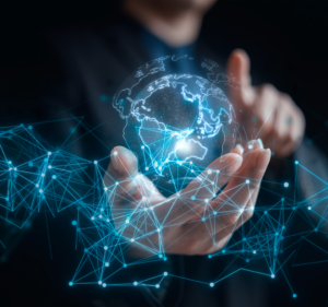 Photo illustration of globe in hand