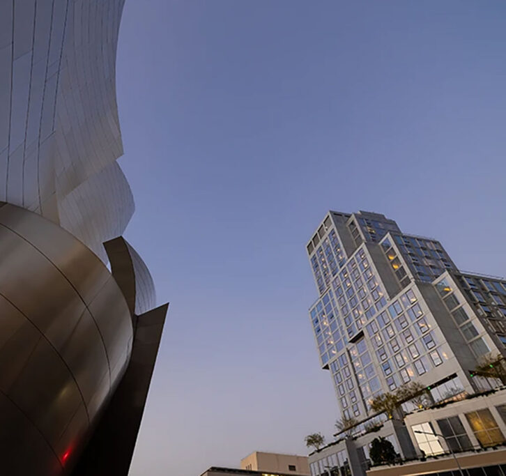 View looking up at two buildings