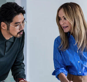 Two people talking in an office