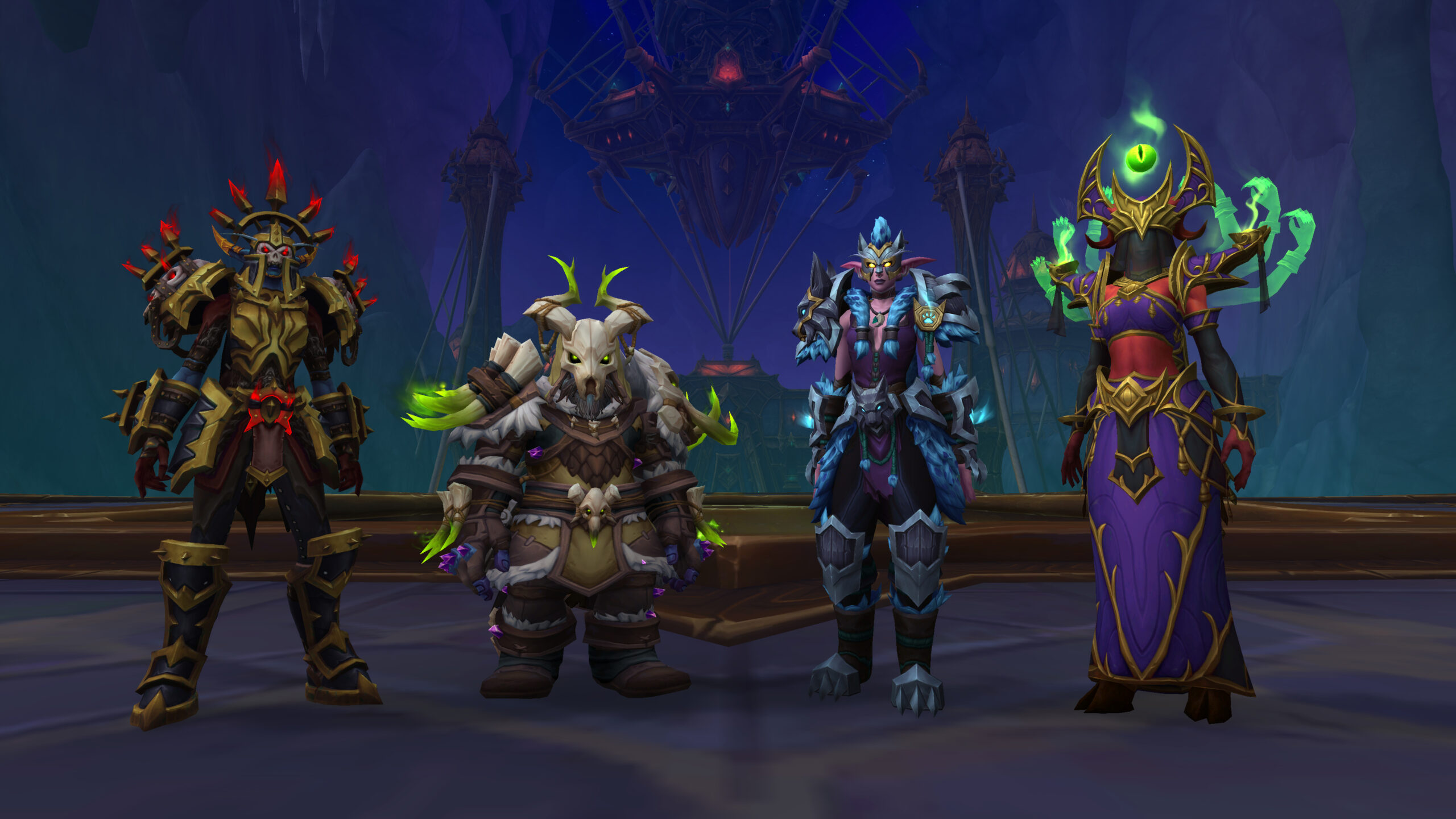 Four characters from World of Warcraft dressed in an array of armor