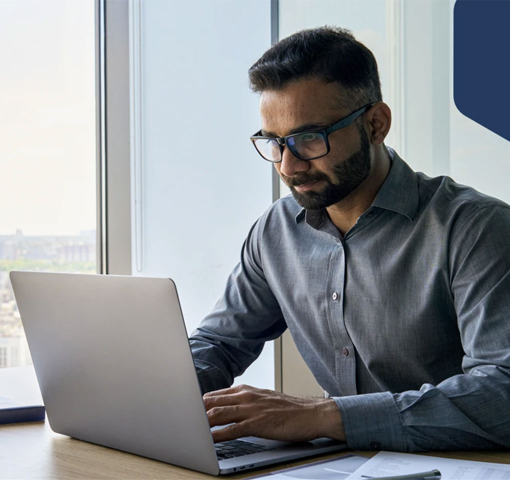 Man working at a laptop computer