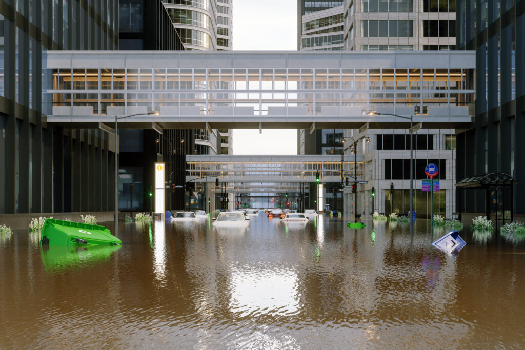 Flooded city with submerged cars and debris.