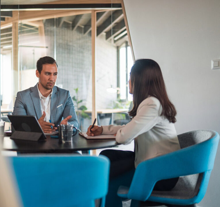 Two people having a business meeting.